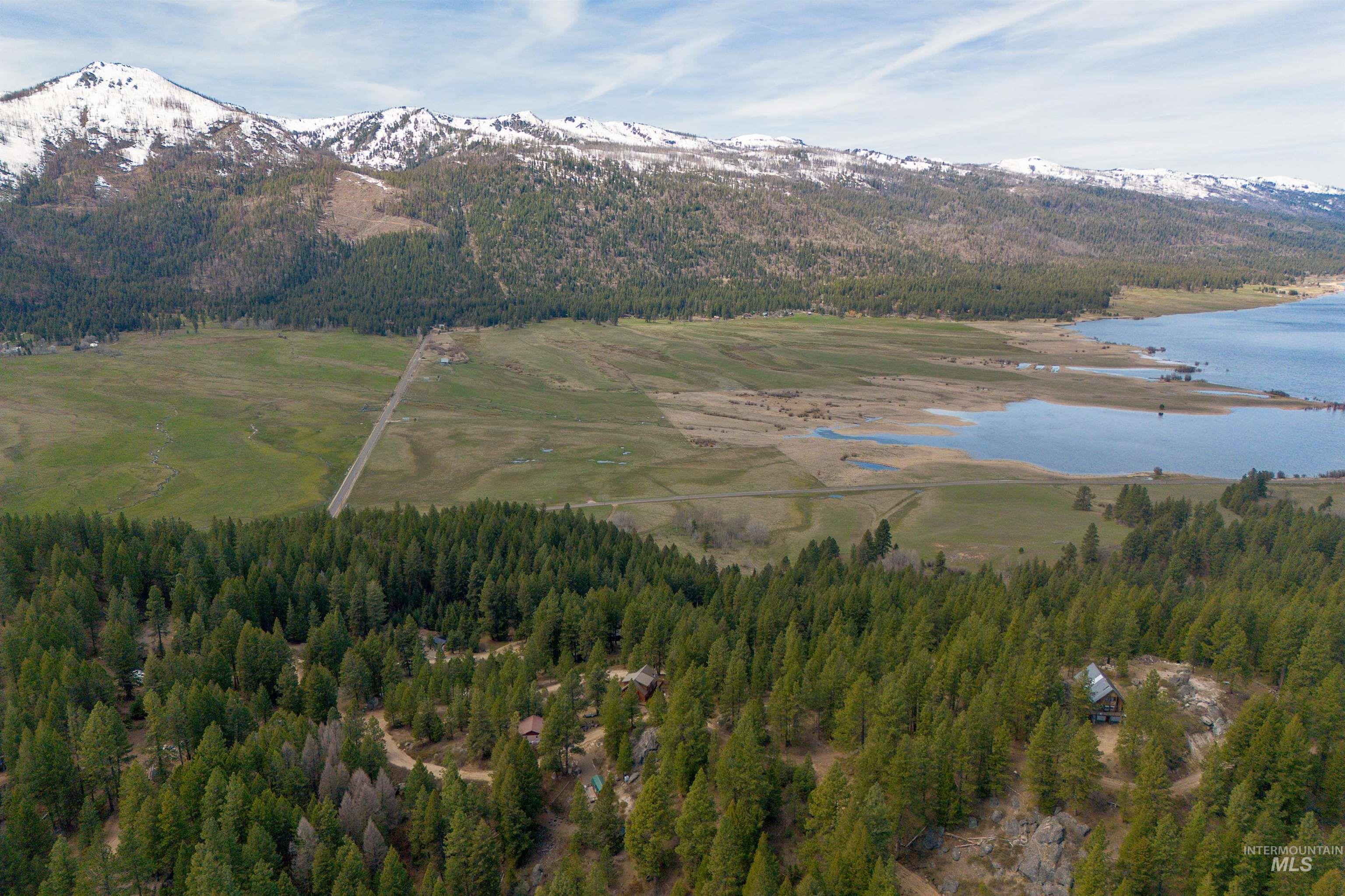 506 Hilltop Road Cascade, ID 83611 - Photo 24 of 36 Bird's eye view of a water and mountain view