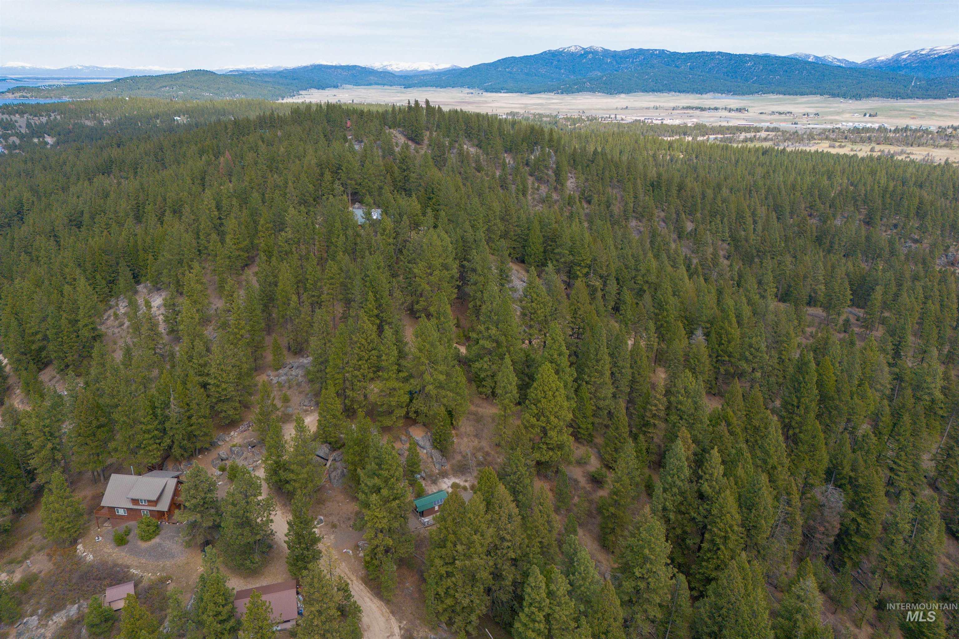 506 Hilltop Road Cascade, ID 83611 - Photo 31 of 36 Bird's eye view of a mountain backdrop