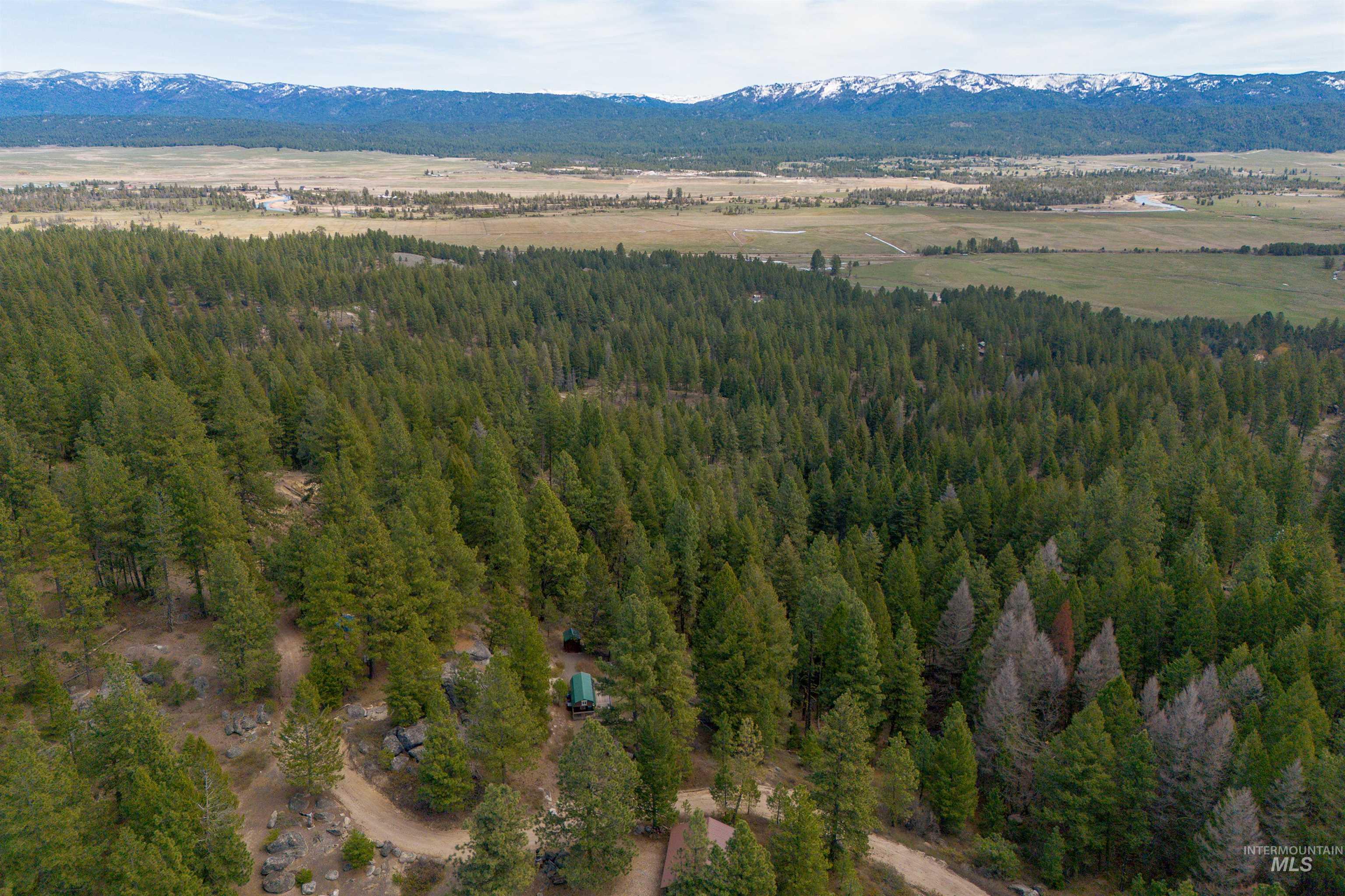 506 Hilltop Road Cascade, ID 83611 - Photo 32 of 36 Bird's eye view of a mountain backdrop