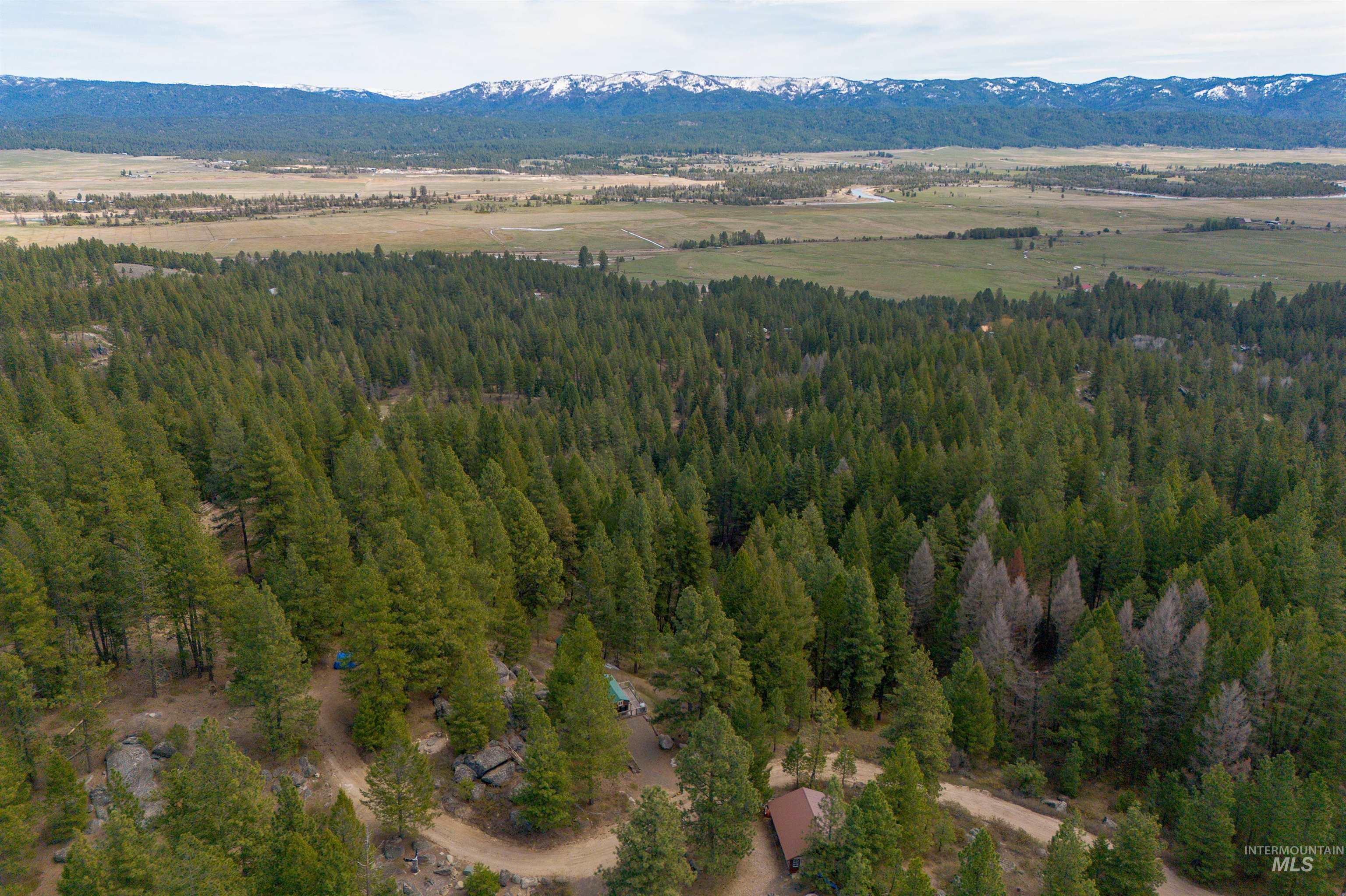 506 Hilltop Road Cascade, ID 83611 - Photo 33 of 36 Drone / aerial view of mountains
