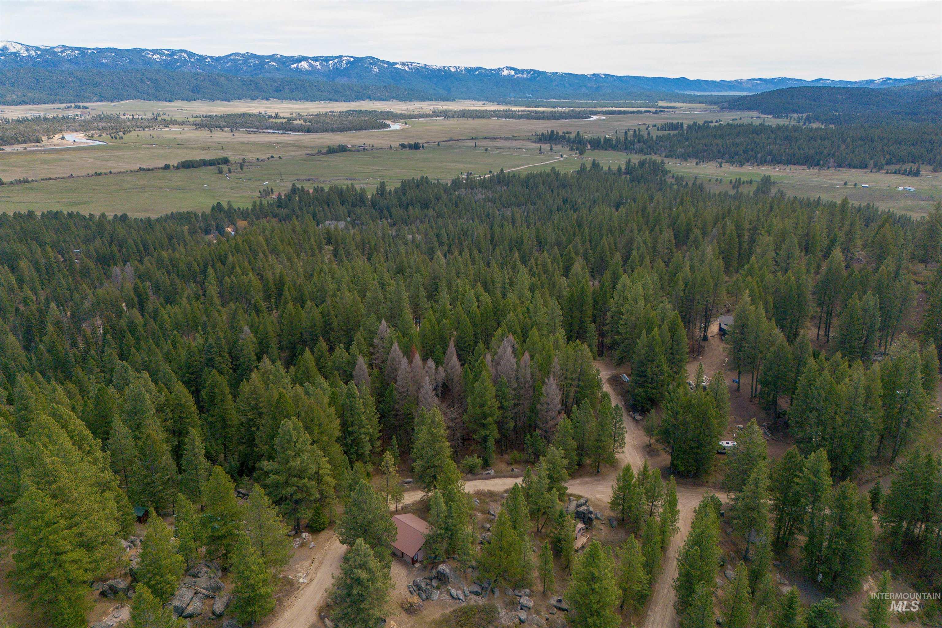506 Hilltop Road Cascade, ID 83611 - Photo 35 of 36 Aerial view of a mountain backdrop