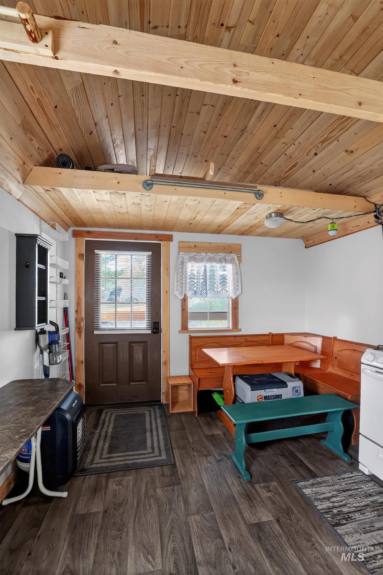 506 Hilltop Road Cascade, ID 83611 - Photo 8 of 36 Interior space featuring wood finished floors and a wooden ceiling with exposed beams