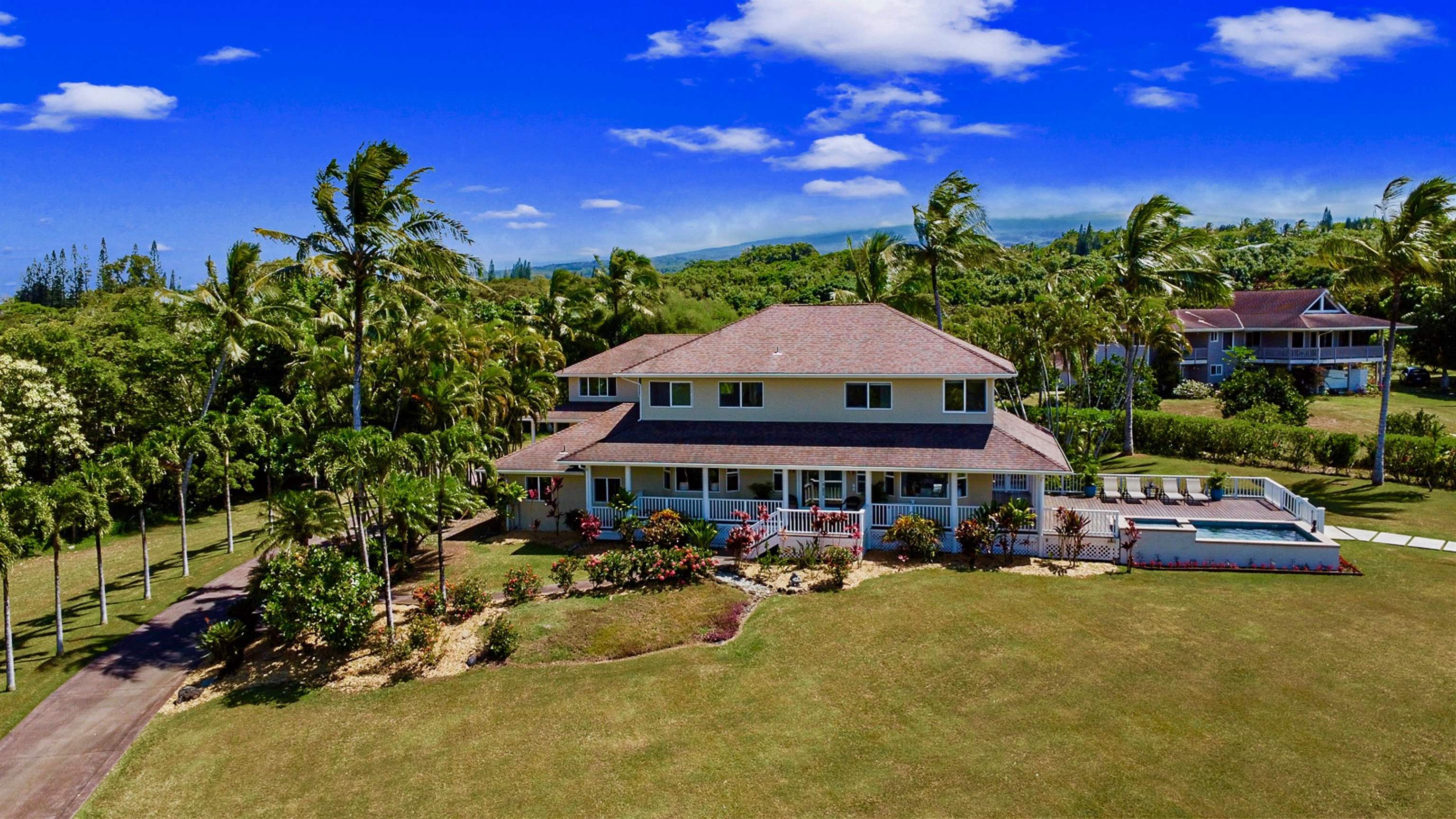 500 North Holokai Place Haiku, HI 96708 - Photo 1 of 30 a view of a swimming pool with sitting area