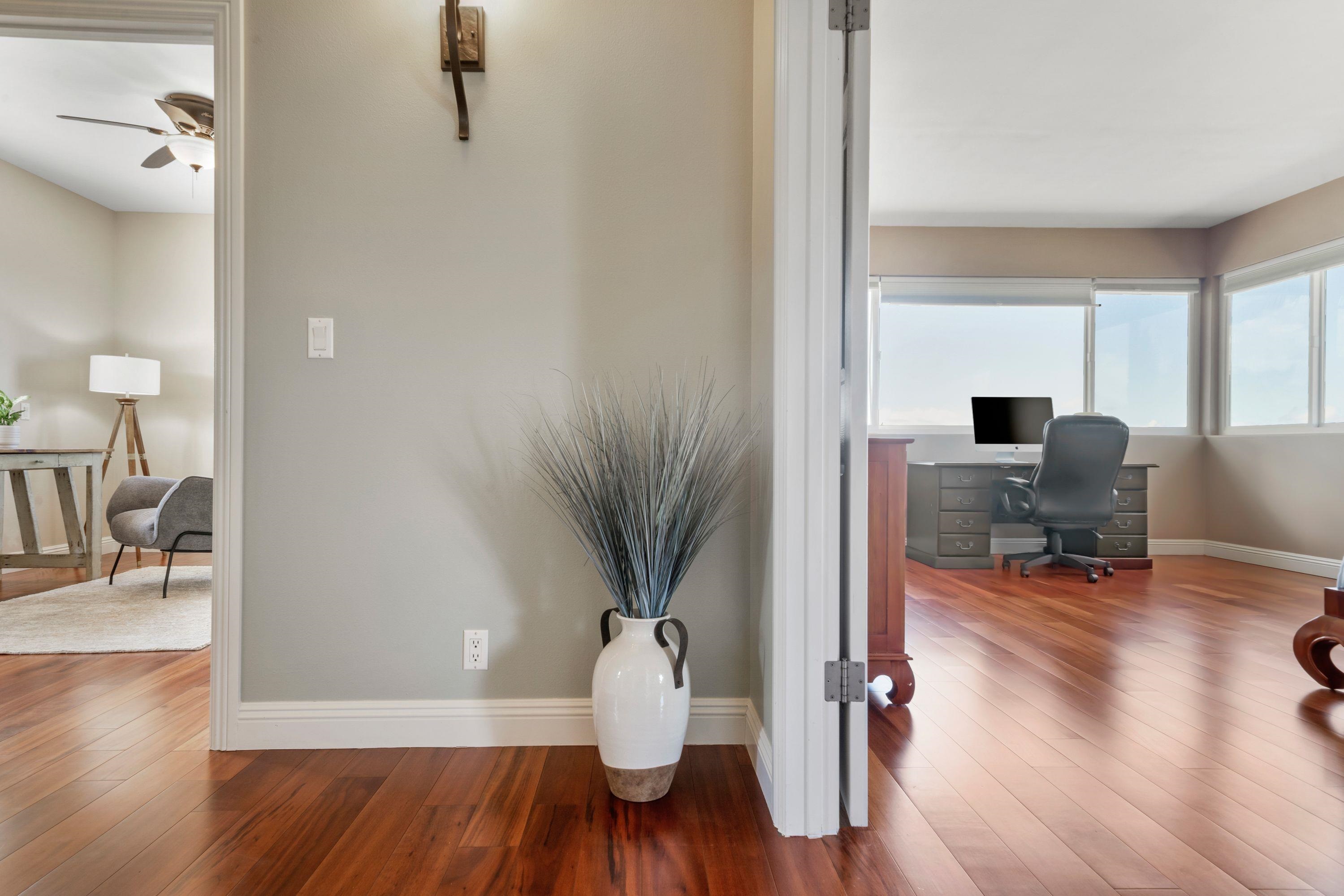 500 North Holokai Place Haiku, HI 96708 - Photo 19 of 30 a view of a workspace with wooden floor and a bathroom