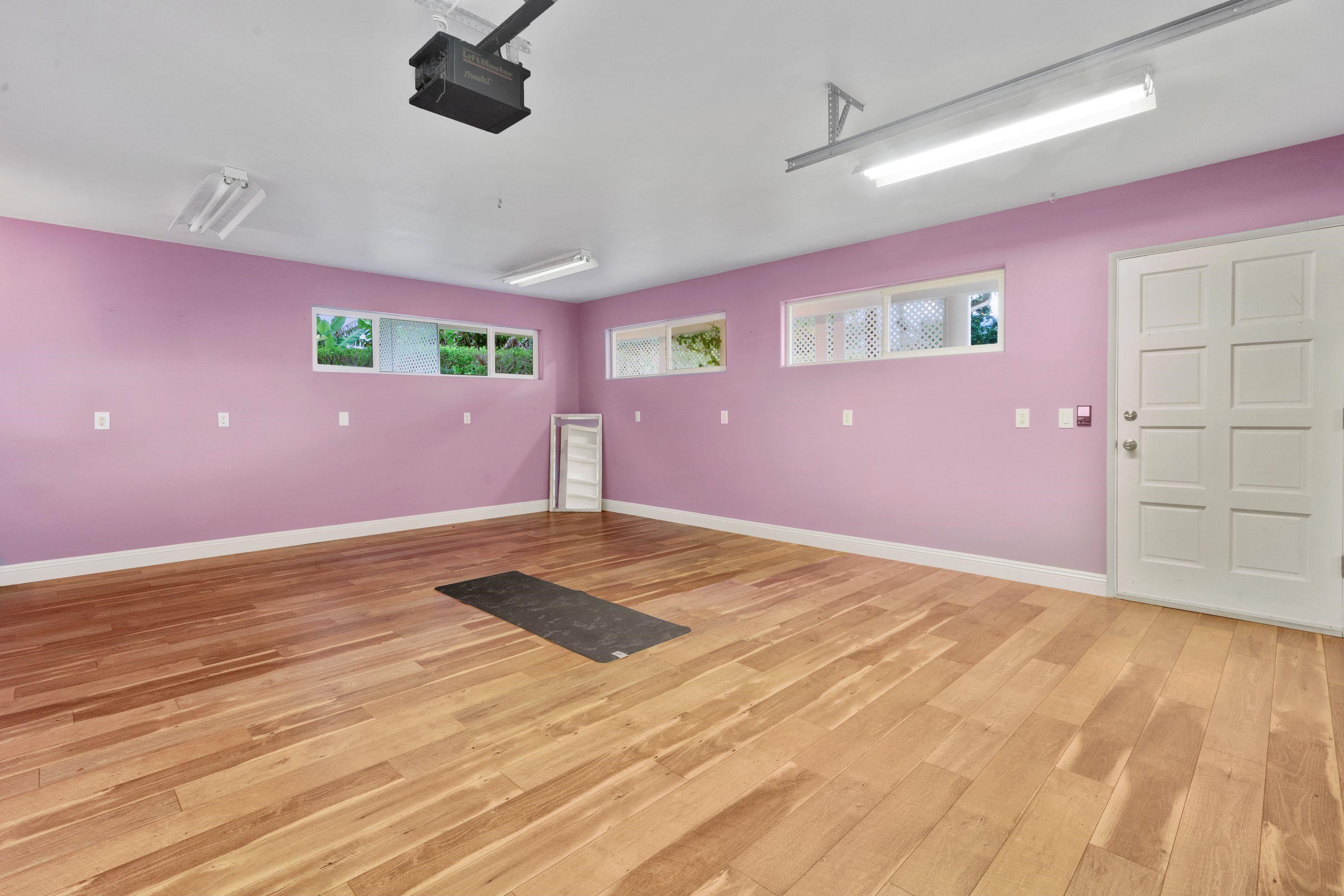 500 North Holokai Place Haiku, HI 96708 - Photo 28 of 30 a view of empty room with window and wooden floor