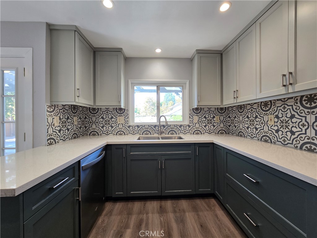6731 Dove Lane Riverside, CA 92506 - Photo 9 of 28 a kitchen with sink cabinets and window
