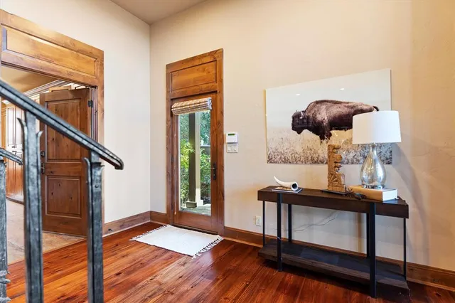 a kitchen with stainless steel appliances granite countertop a stove and a refrigerator