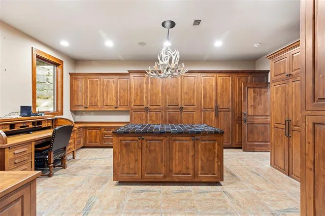 a utility room with sink dryer and washer