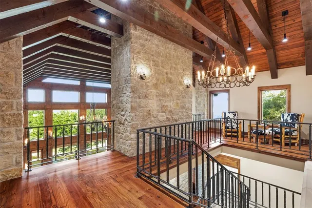 a view of a balcony with furniture