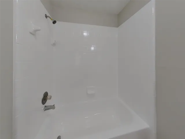 a close view of a bathtub in bathroom