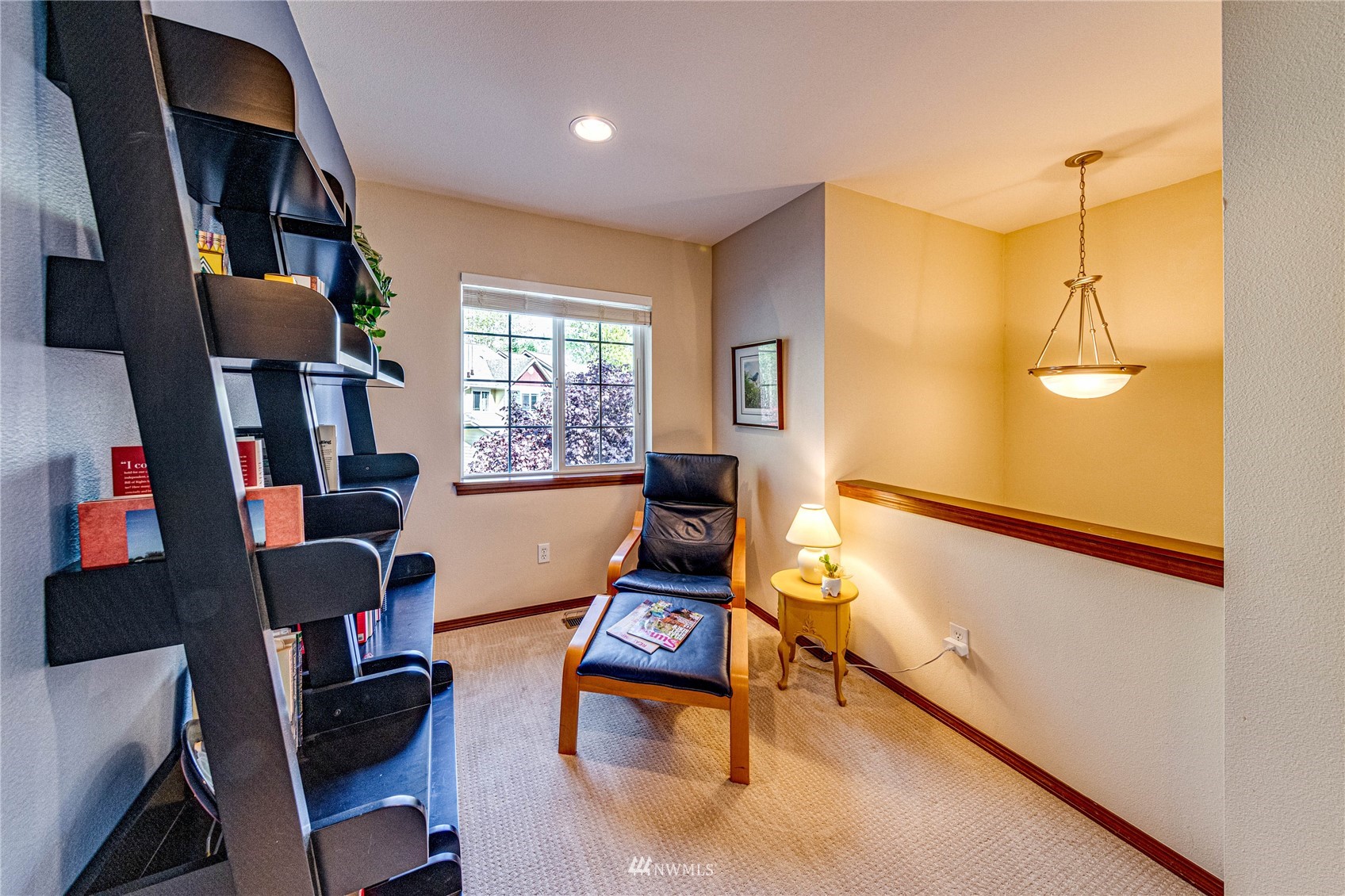 21318 11th Drive Southeast Bothell, WA 98021 - Photo 19 of 27 a living room with furniture and a flat screen tv