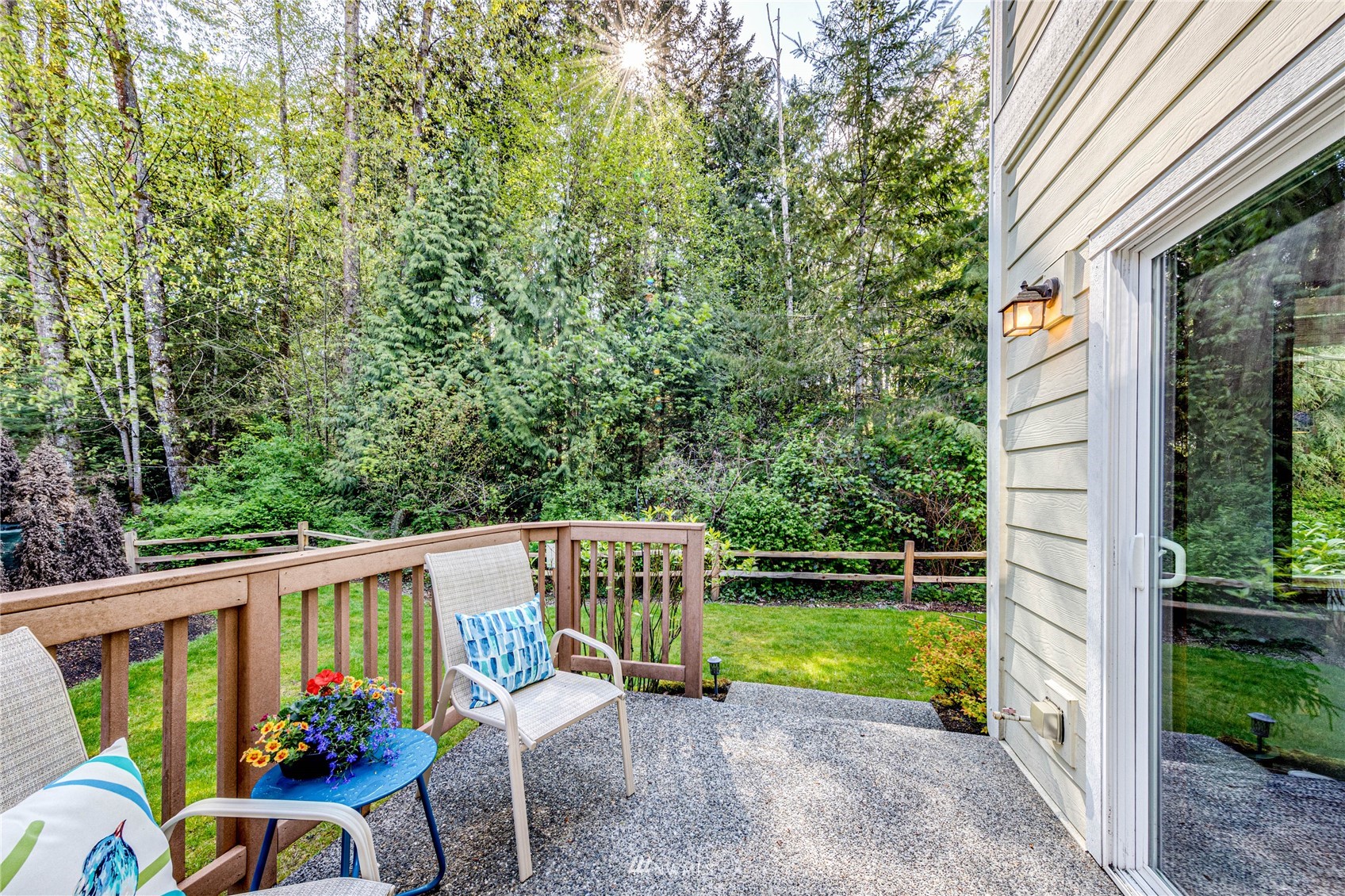21318 11th Drive Southeast Bothell, WA 98021 - Photo 23 of 27 a view of a chair and tables in the balcony