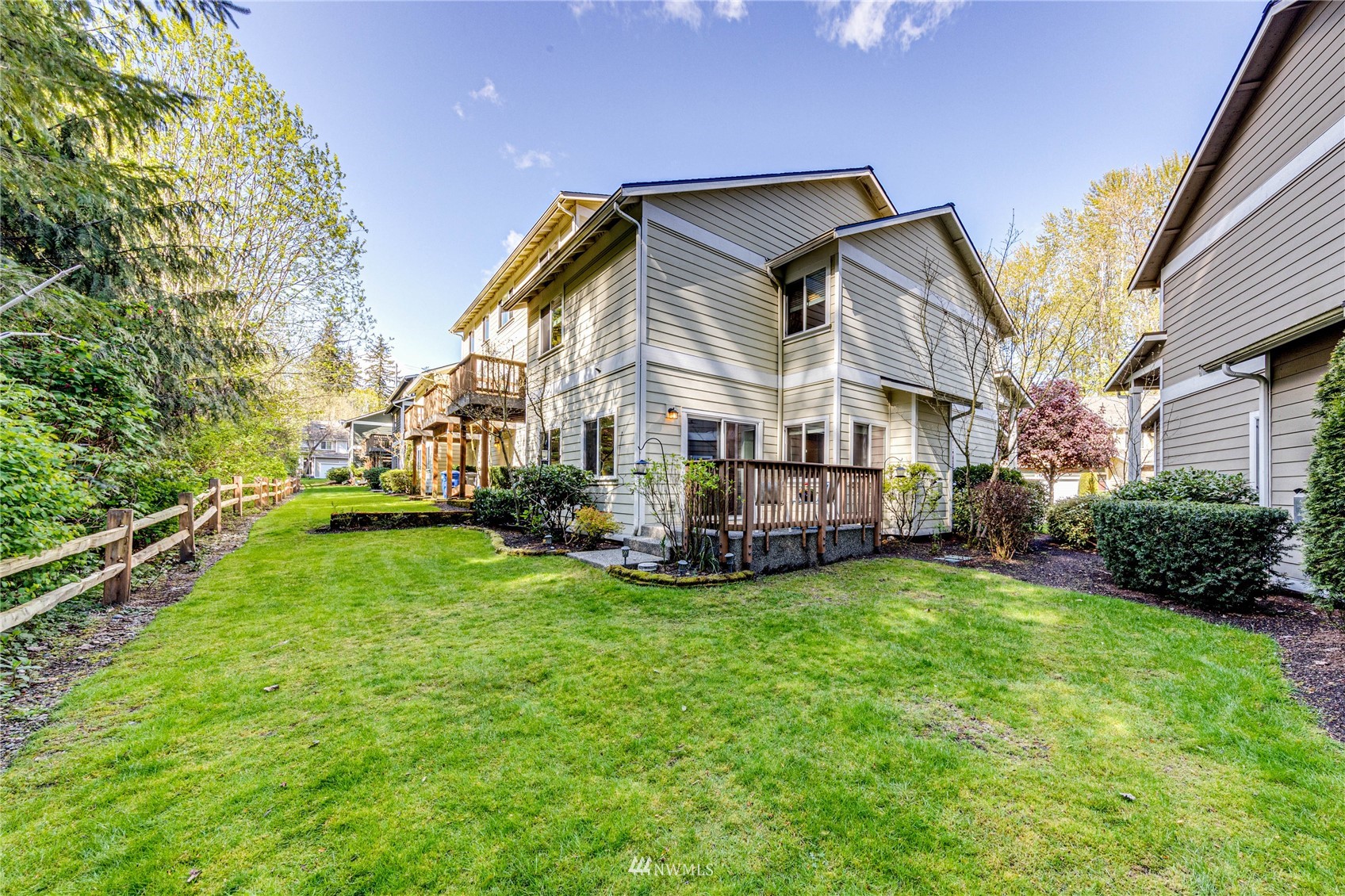 21318 11th Drive Southeast Bothell, WA 98021 - Photo 25 of 27 a view of a house with a yard and sitting area