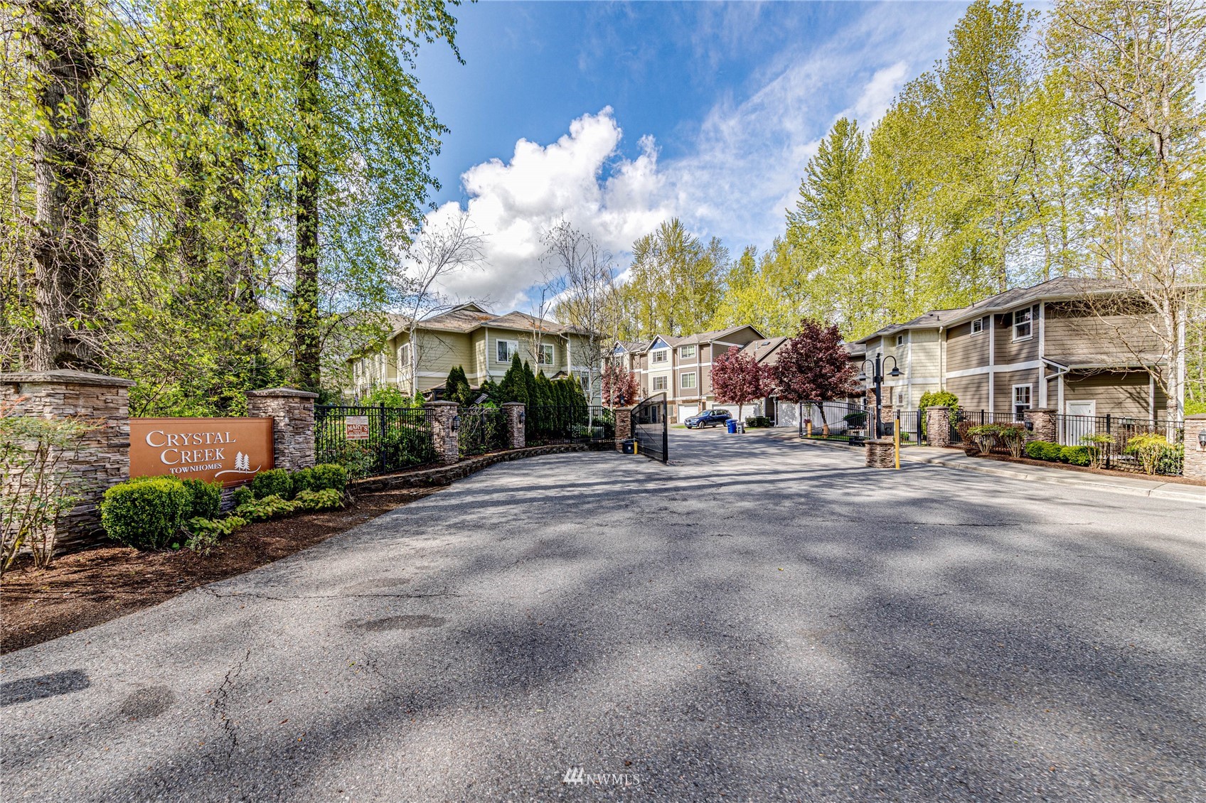 21318 11th Drive Southeast Bothell, WA 98021 - Photo 27 of 27 a city street lined with buildings and trees
