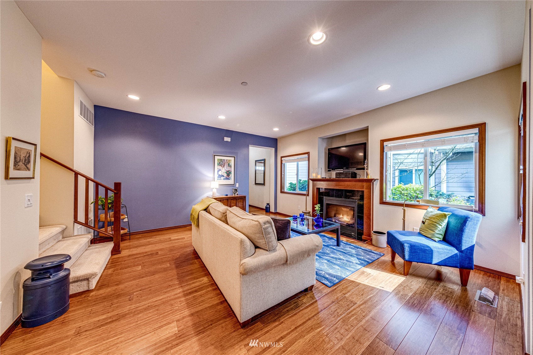 21318 11th Drive Southeast Bothell, WA 98021 - Photo 4 of 27 a living room with furniture and a flat screen tv