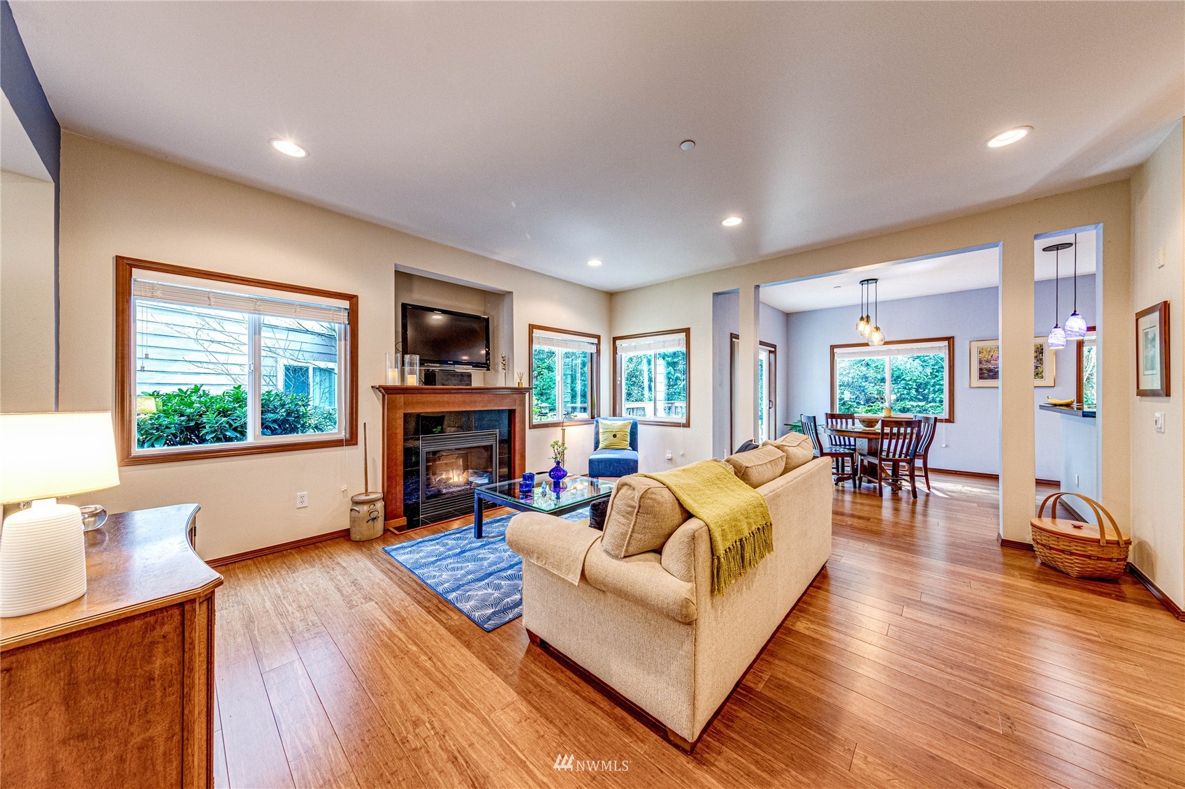 21318 11th Drive Southeast Bothell, WA 98021 - Photo 5 of 27 a living room with fireplace furniture and a wooden floor