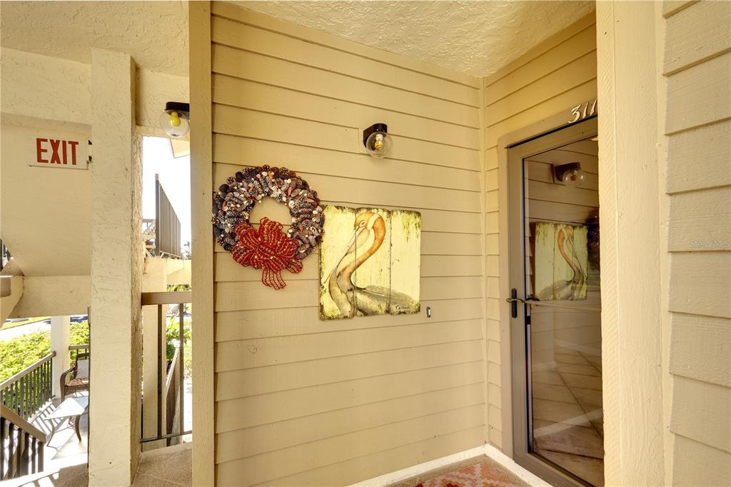 3920 Mariners Way, Unit 311C Cortez, FL 34215 - Photo 2 of 35 a bathroom with a shower