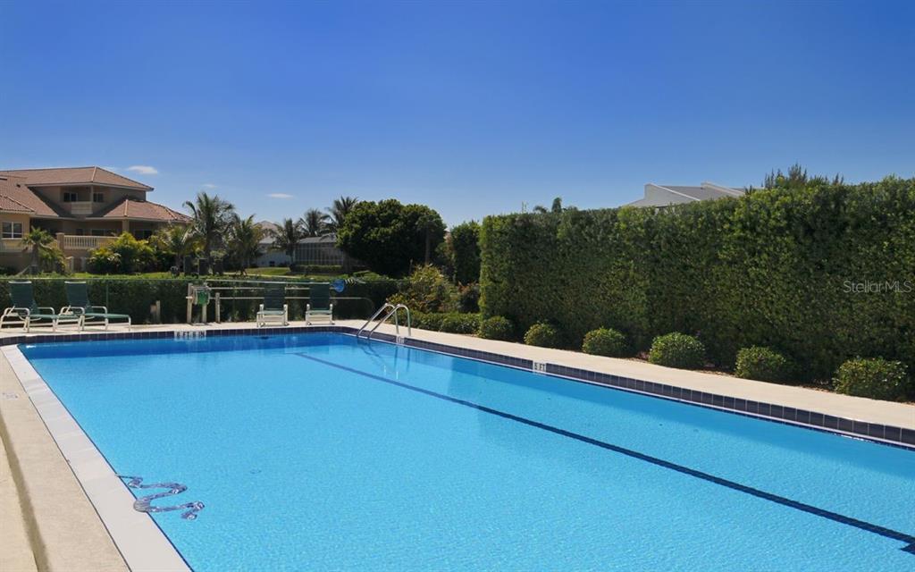 3920 Mariners Way, Unit 311C Cortez, FL 34215 - Photo 32 of 35 a view of a outdoor space with mountain view