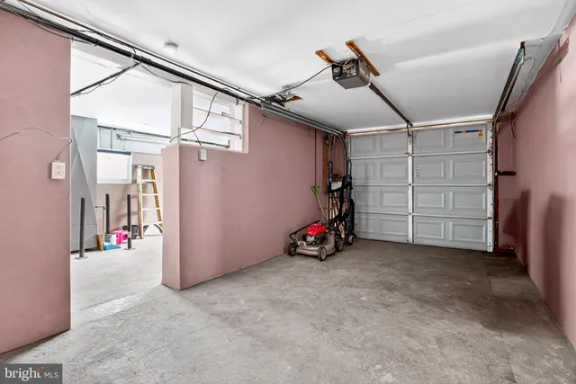 a view of a big room with closet and windows