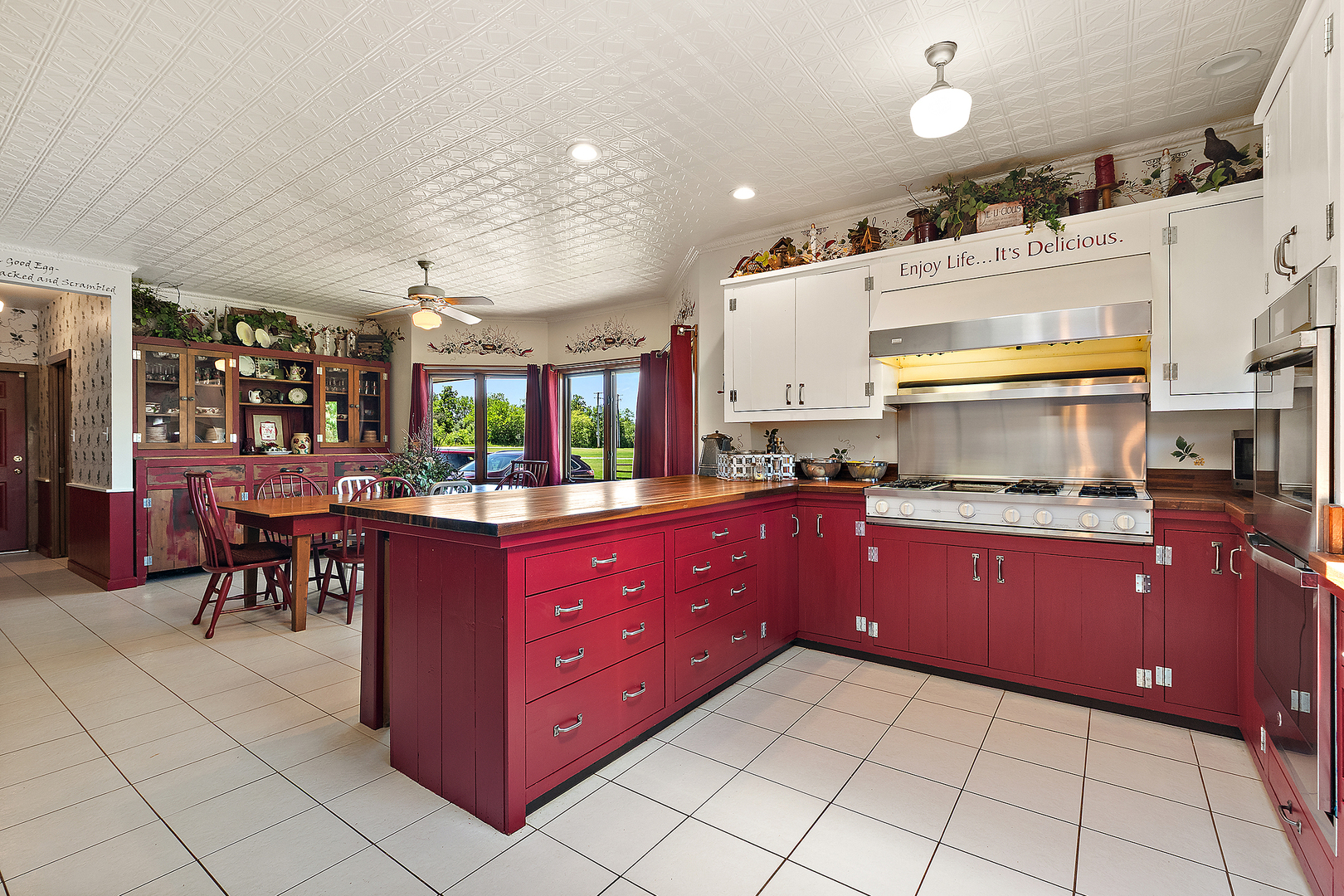7860 West Steger Road Frankfort, IL 60423 - Photo 23 of 56 a kitchen with stainless steel appliances granite countertop a stove a sink and a refrigerator