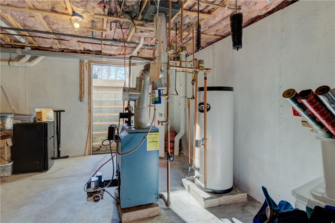 918 Saugatucket Road South Kingstown, RI 02879 - Photo 31 of 42 Bulkhead. Hot water tank installed in 2024. Radon mitigation pipe.