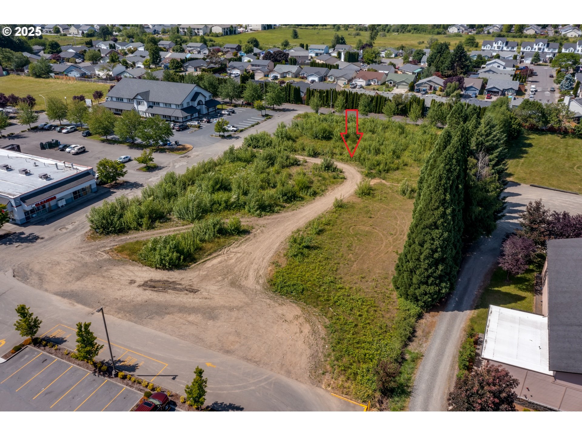 0 Northwest 2nd Street, Unit 3 Battle Ground, WA 98604 - Photo 7 of 12 an aerial view of residential houses with outdoor space