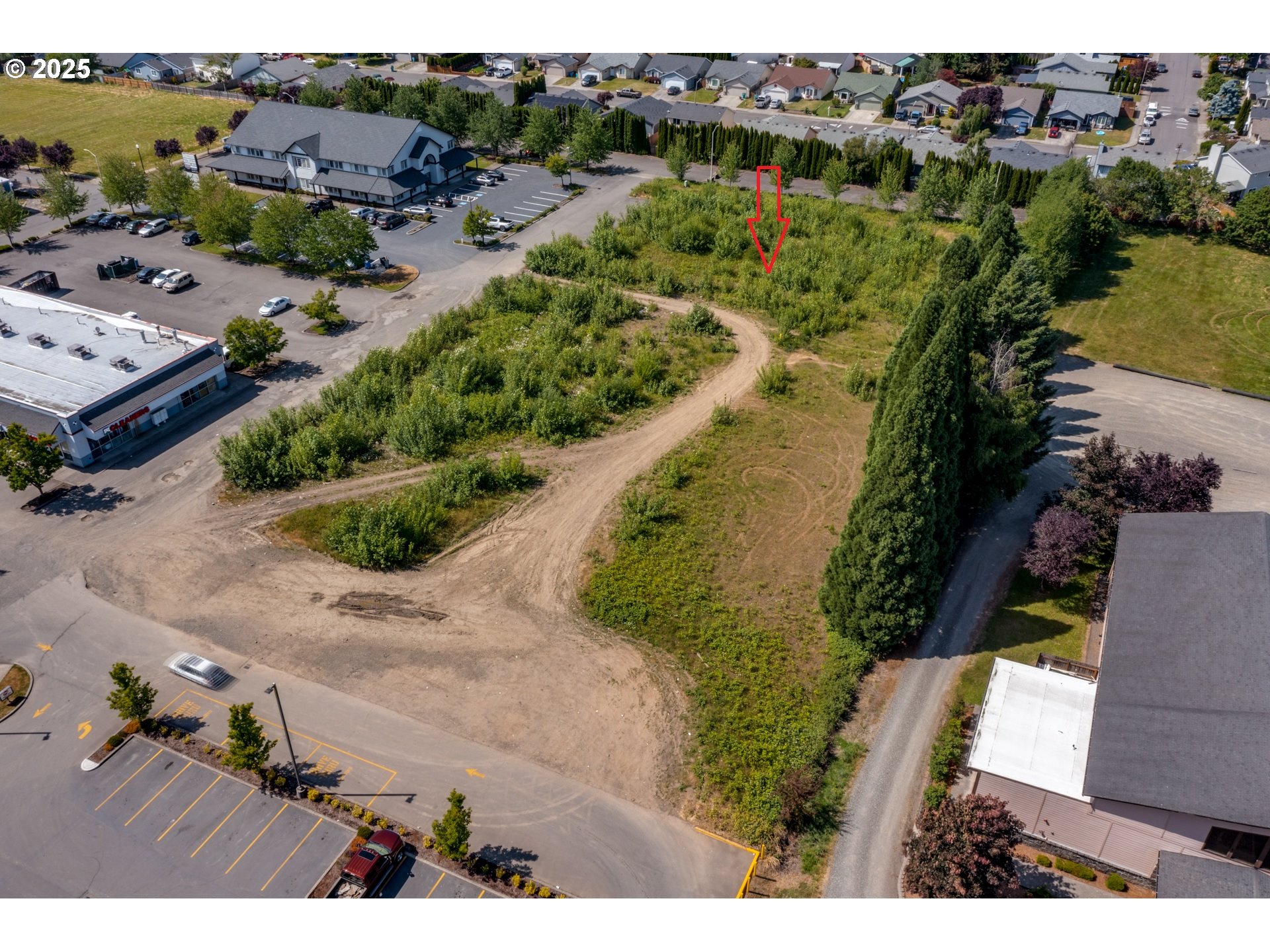 0 Northwest 2nd Street, Unit 3 Battle Ground, WA 98604 - Photo 8 of 12 an aerial view of lake residential house with swimming pool