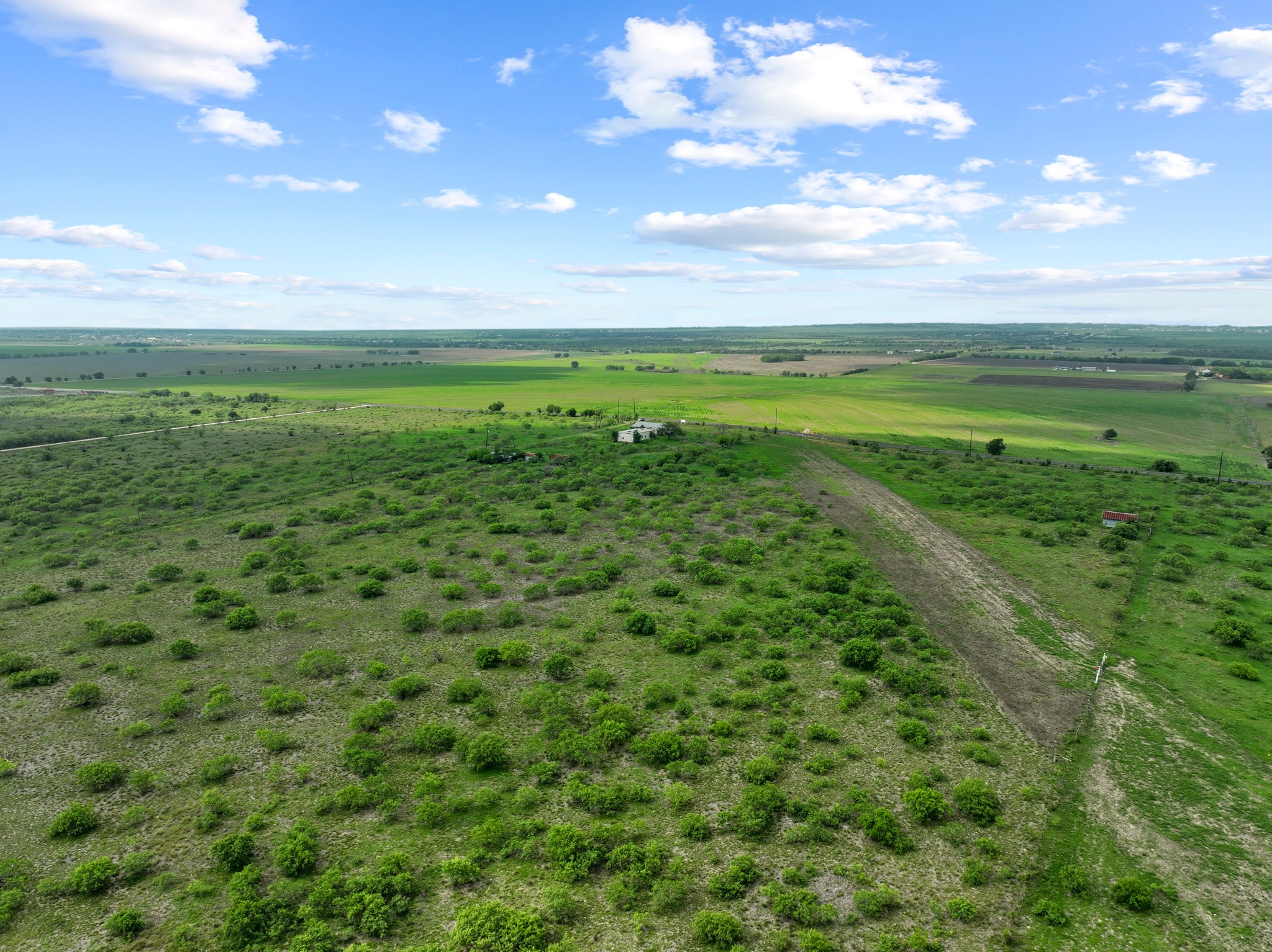 14104 Hokanson Road Del Valle, TX 78617 - Photo 13 of 15 a view of a field with an outdoor space