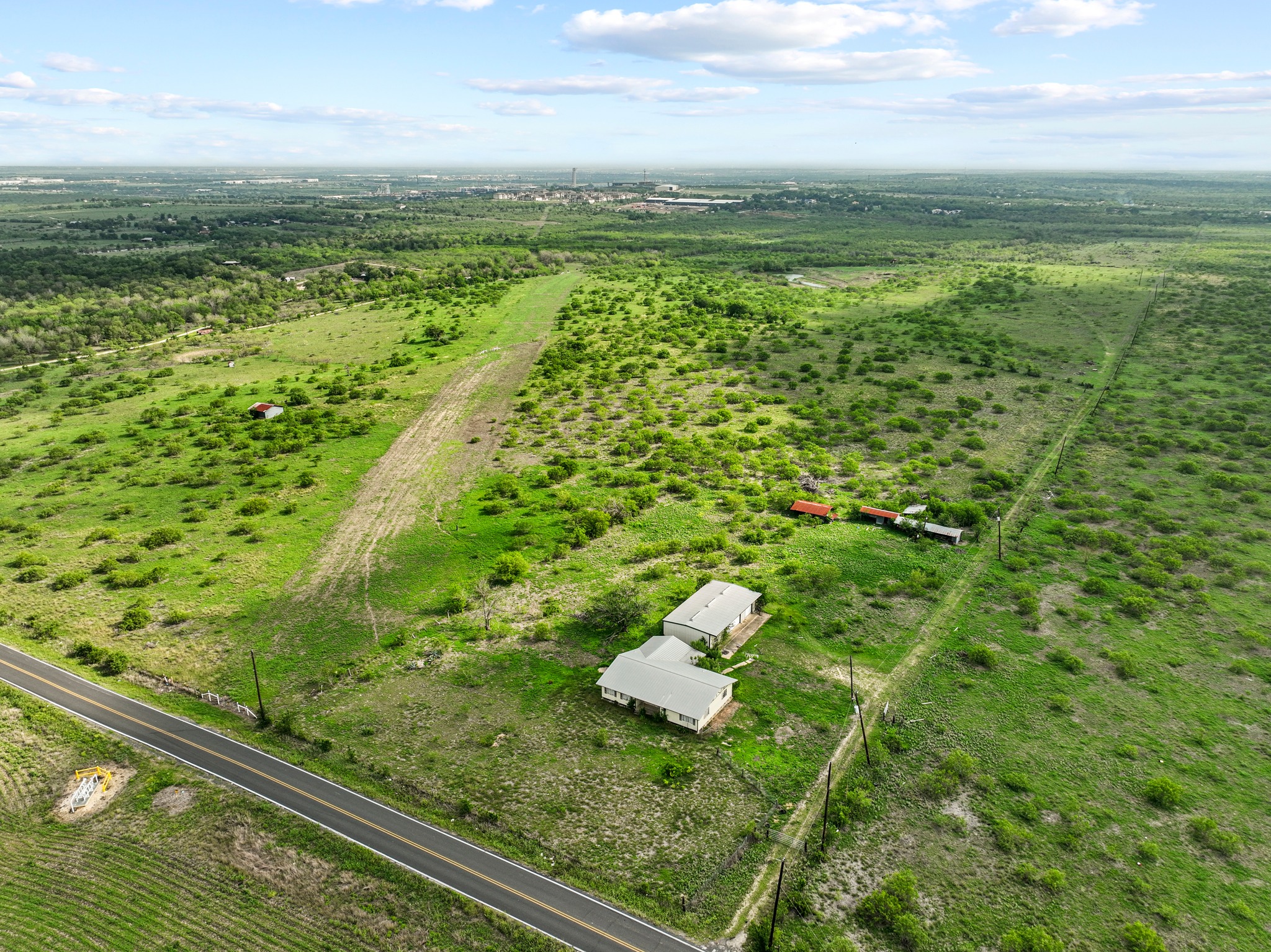 14104 Hokanson Road Del Valle, TX 78617 - Photo 10 of 15 a view of a yard with an outdoor seating