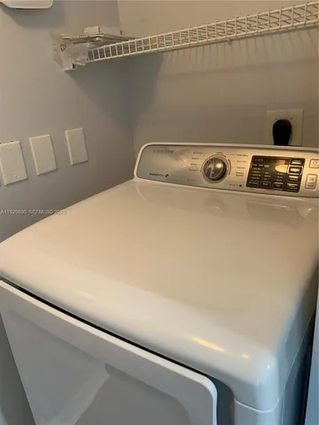 a close up view of washer and dryer