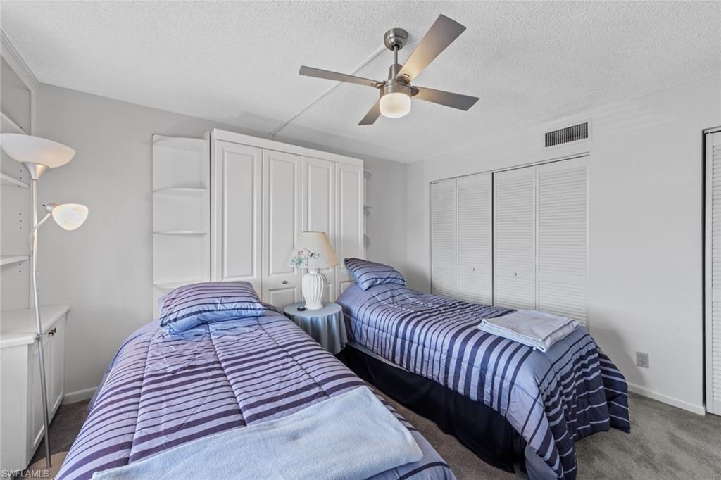 865 Teryl Road, Unit 2114 Naples, FL 34112 - Photo 23 of 50 Guest Bedroom with Murphy bed and 2 singles