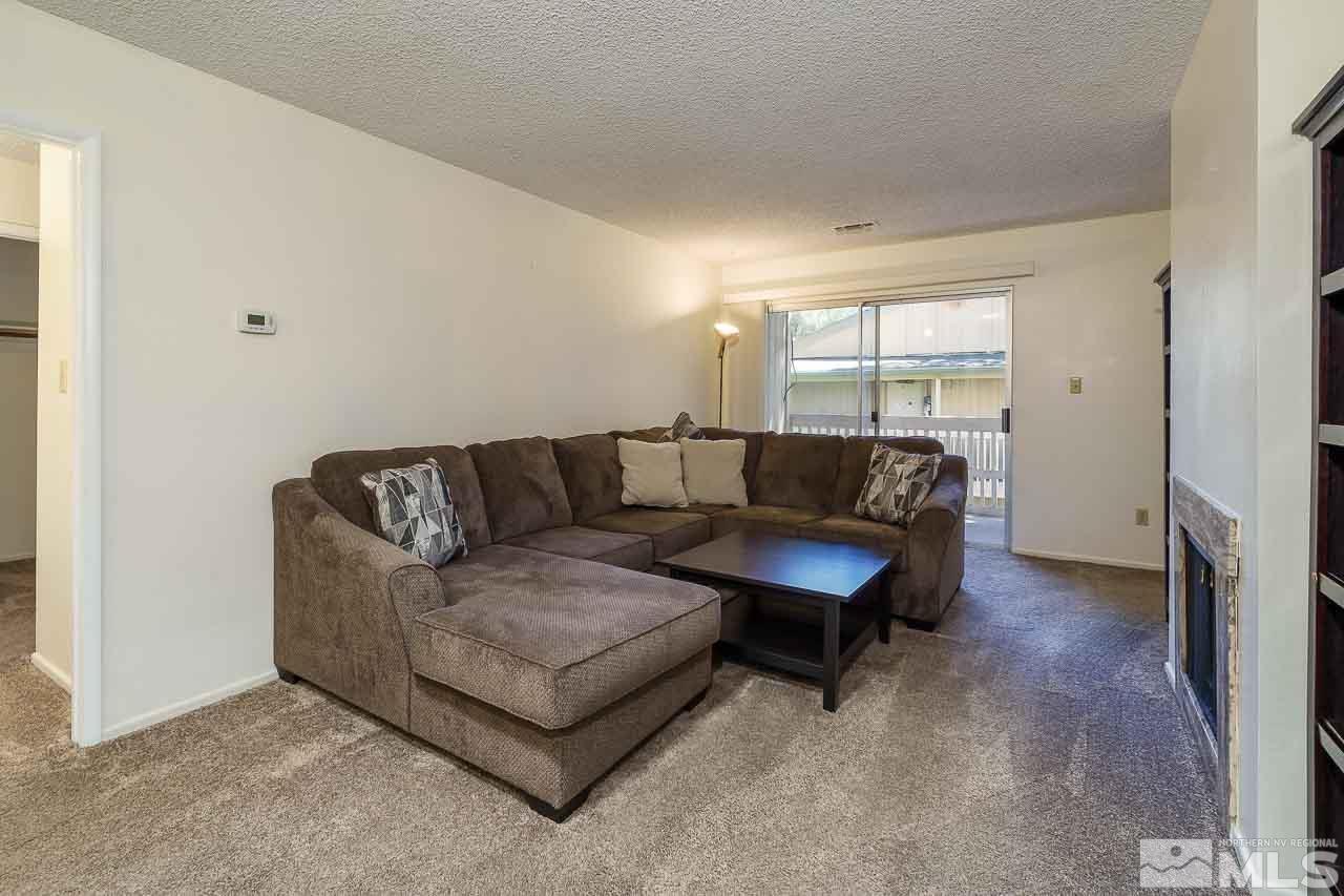 2300 Dickerson Road, Unit 36 Reno, NV 89503 - Photo 8 of 25 a living room with furniture and a window