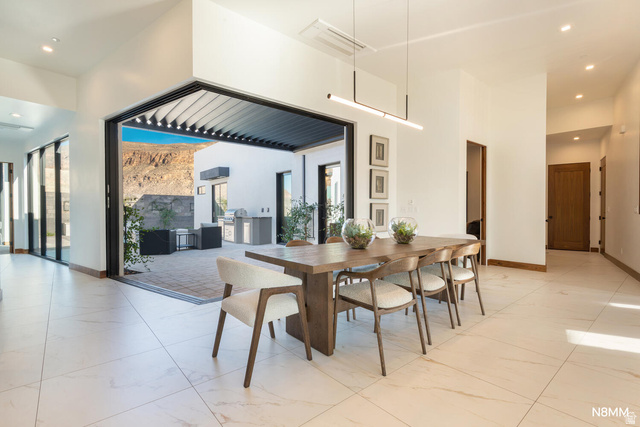 3607 South Cypress Pt Road Hurricane, UT 84737 - Photo 26 of 59 Dining area with recessed lighting and a high ceiling