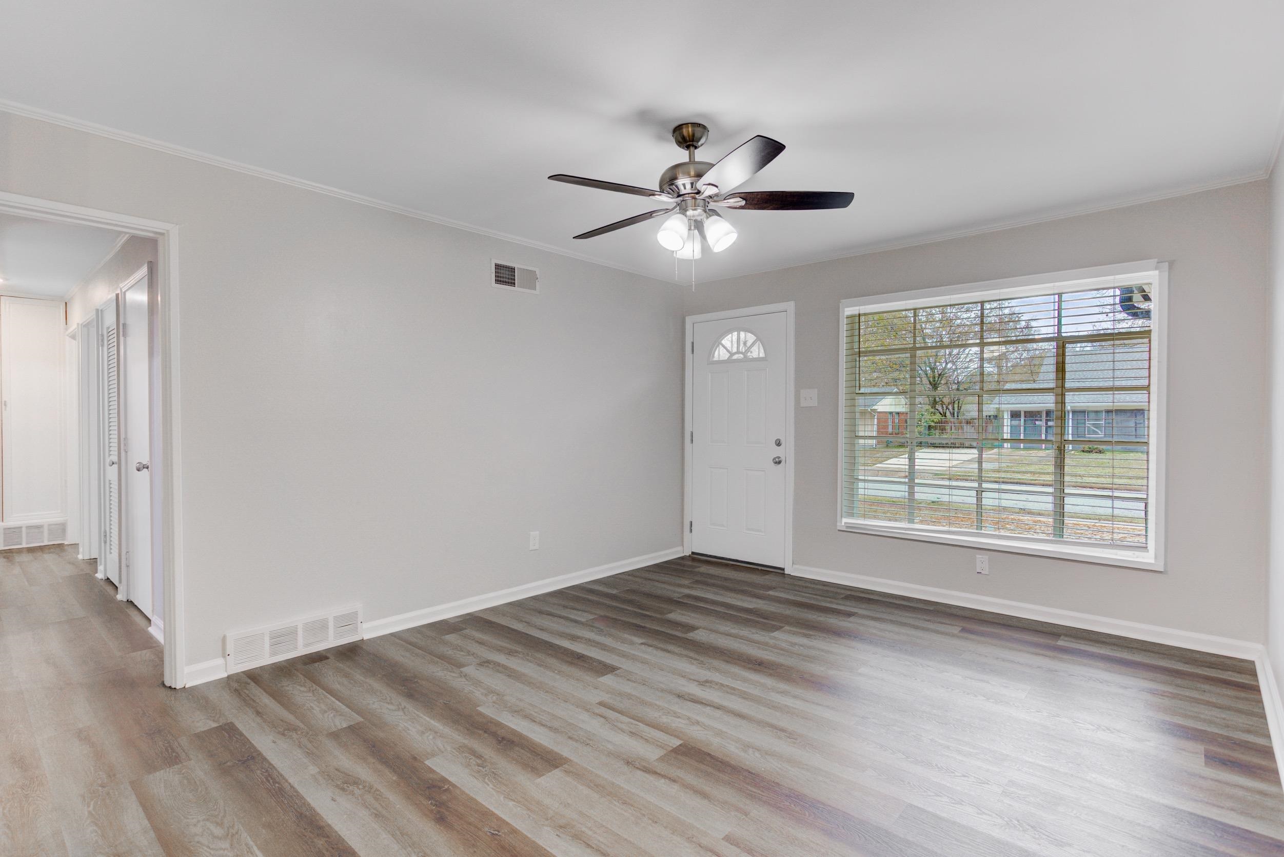 1784 Sea Isle Road Memphis, TN 38117 - Photo 5 of 27 Entrance foyer with light wood-style floors, ornamental molding, and a ceiling fan