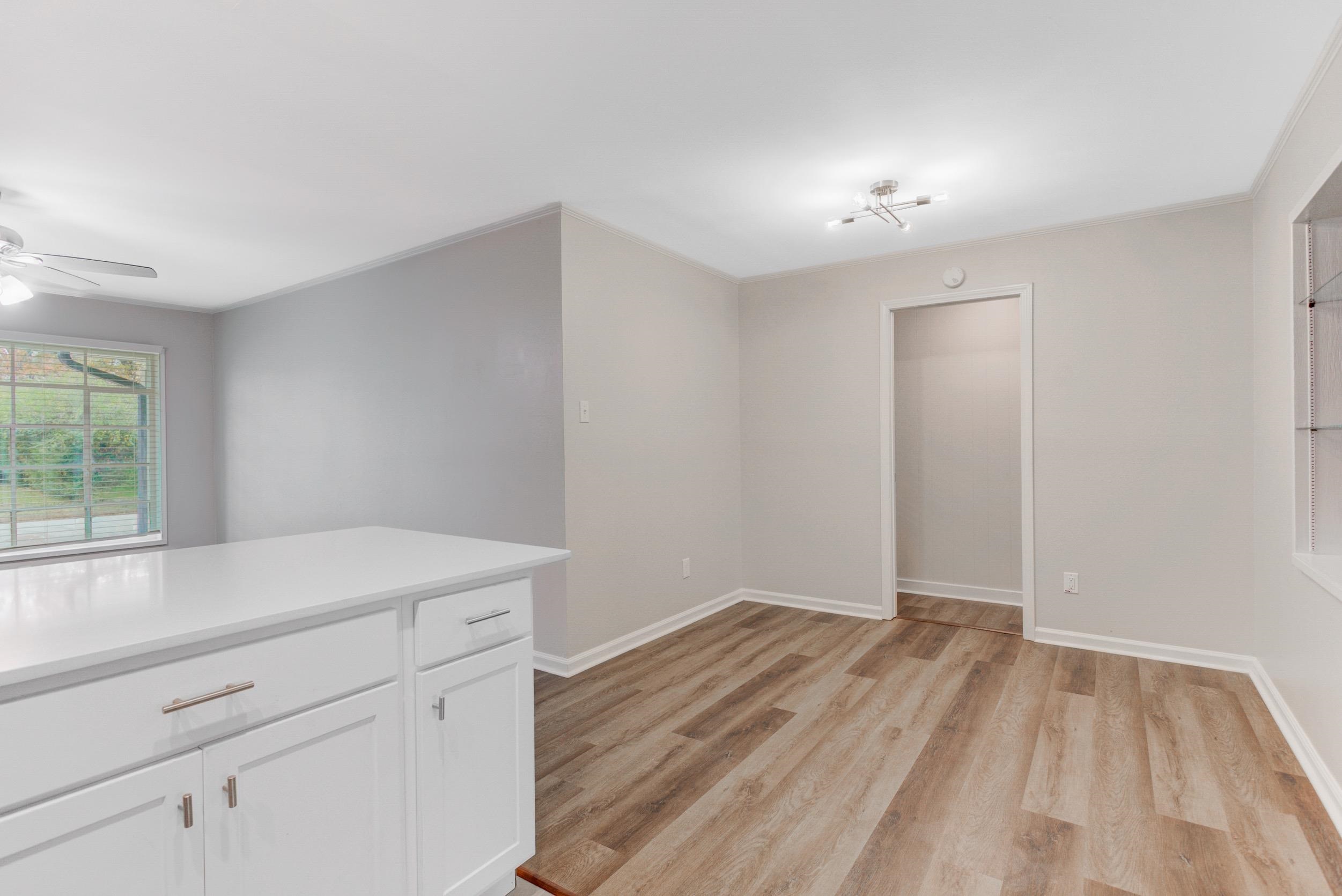 1784 Sea Isle Road Memphis, TN 38117 - Photo 6 of 27 Spare room featuring light wood-style flooring and ceiling fan