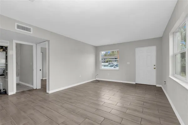 an empty room with windows
