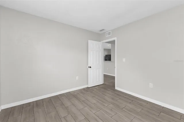 a bathroom with a toilet and a bathtub