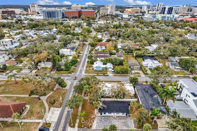 an aerial view of residential building with parking space