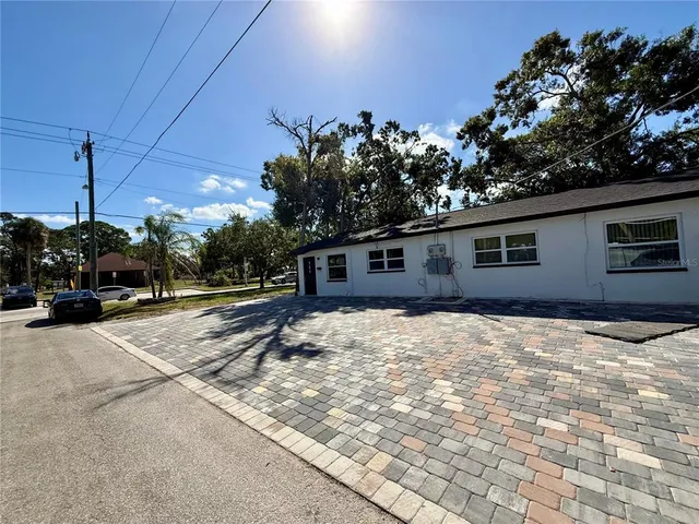 a house view with a outdoor space