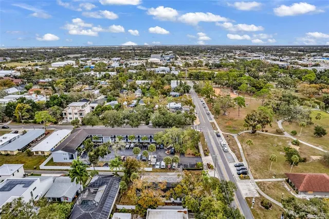 an aerial view of residential building with parking space