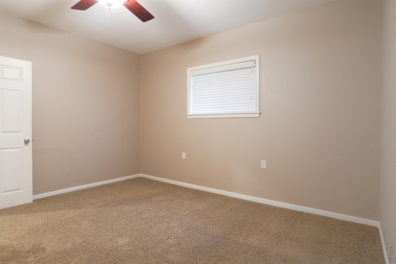 4831 10th Street Lubbock, TX 79416 - Photo 19 of 40 an empty room with a window