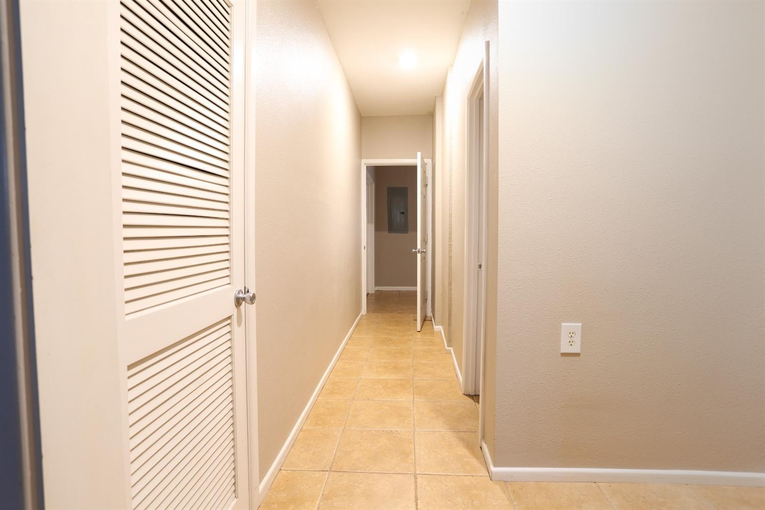 4831 10th Street Lubbock, TX 79416 - Photo 30 of 40 a view of a hallway with a white door