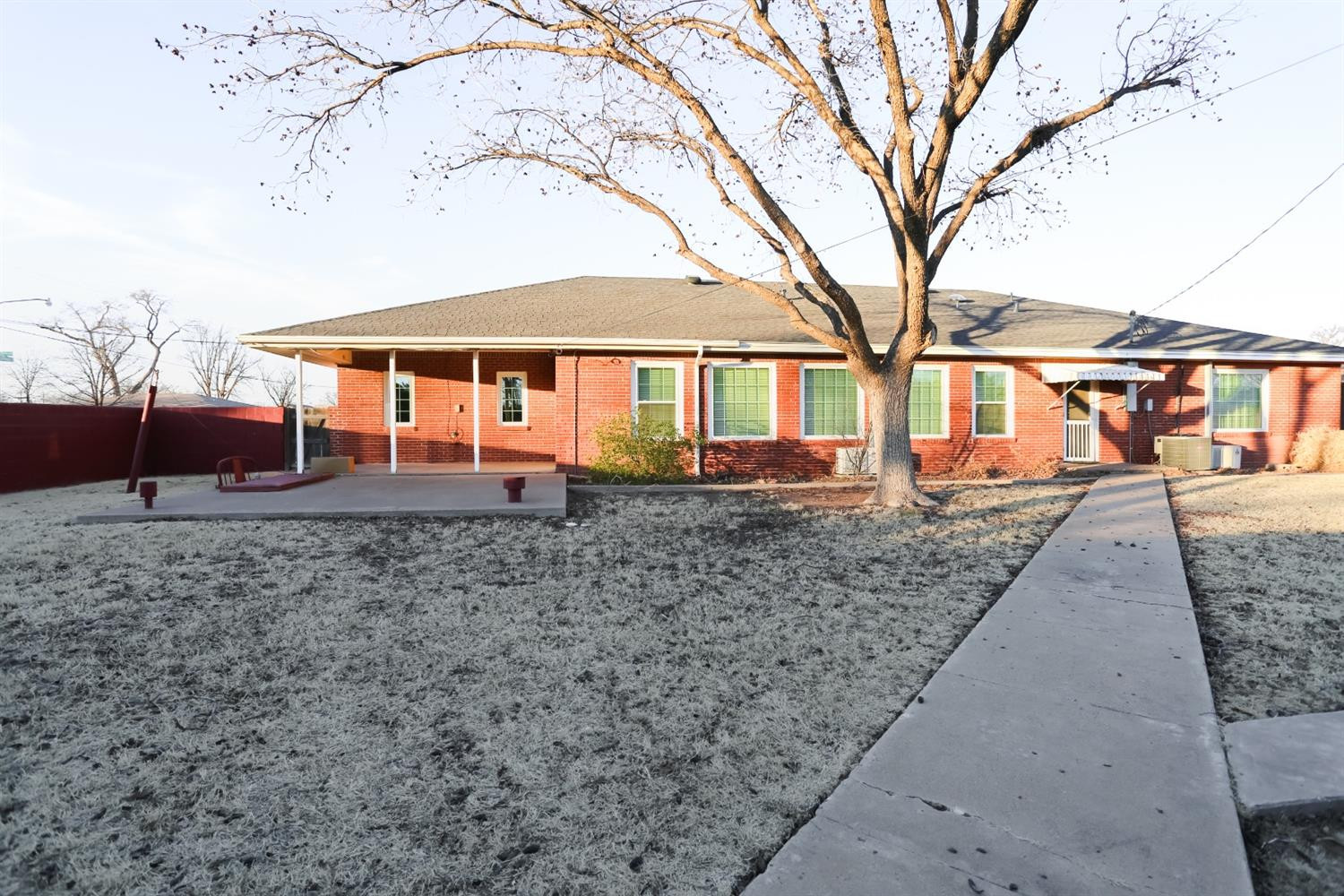 4831 10th Street Lubbock, TX 79416 - Photo 35 of 40 front view of a house with a yard