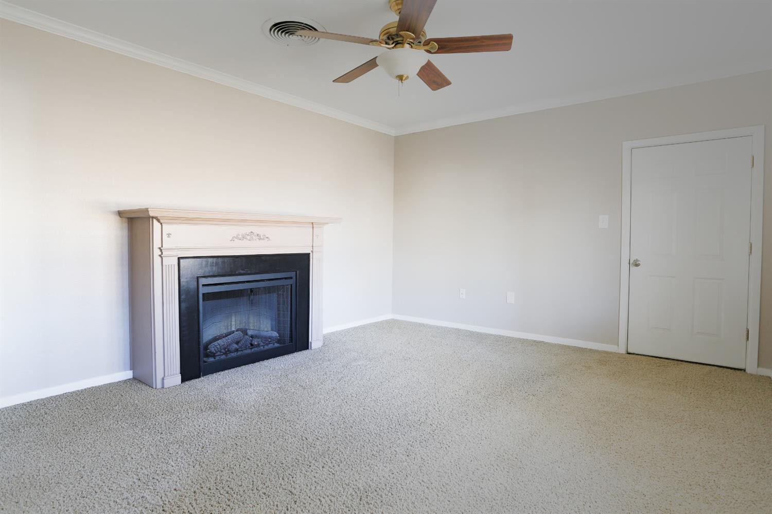 4831 10th Street Lubbock, TX 79416 - Photo 6 of 40 a view of empty room with a fireplace
