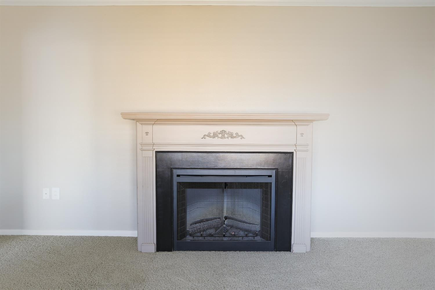 4831 10th Street Lubbock, TX 79416 - Photo 7 of 40 a living room with a fireplace