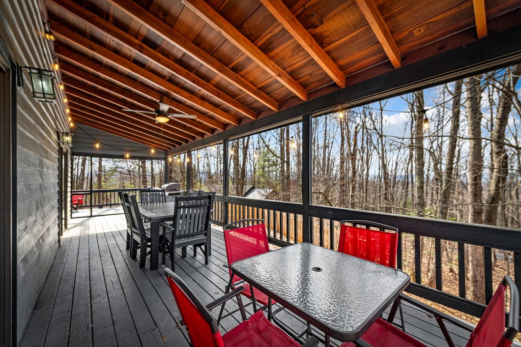 403 Sugar Mountain Road Blue Ridge, GA 30513 - Photo 40 of 84 a view of a balcony with furniture