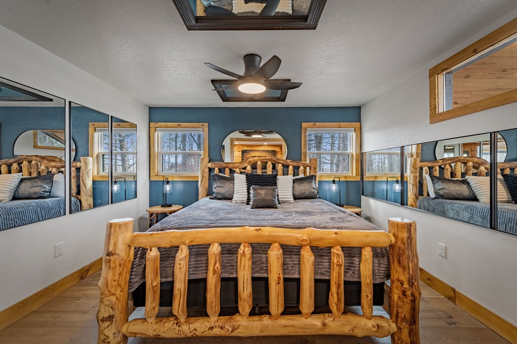 403 Sugar Mountain Road Blue Ridge, GA 30513 - Photo 55 of 84 a bed room with furniture and wooden floor