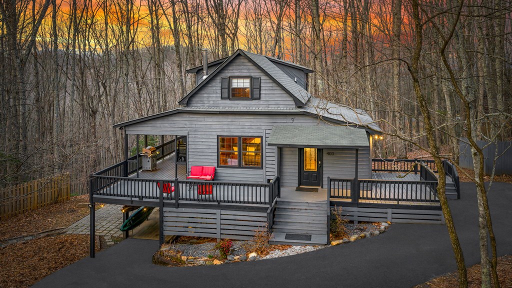 403 Sugar Mountain Road Blue Ridge, GA 30513 - Photo 65 of 84 a front view of a house with a yard
