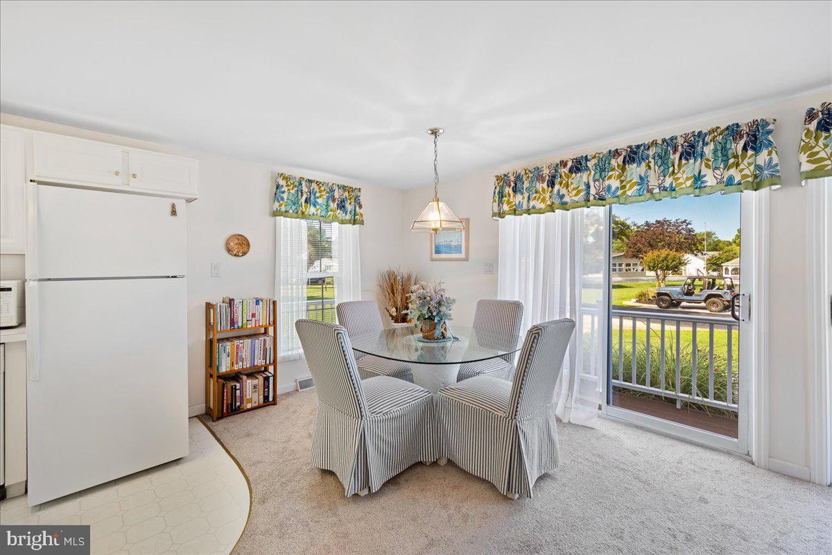 30929 Maplewood Road Ocean View, DE 19970 - Photo 13 of 31 Dining Area Off Kitchen
