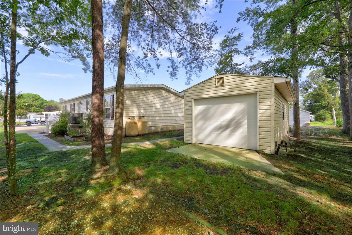 30929 Maplewood Road Ocean View, DE 19970 - Photo 5 of 31 Back and Side with Shed